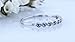 Imagen de Dazzlingrock Collection Anillo de boda minimalista apilable de 9 piedras de diamante azul redondo de 0