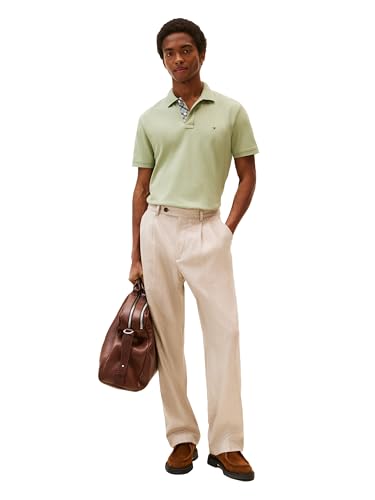 Camisetas polo casuales para hombre de Tommy Hilfiger, manga corta, corte regular con estiramiento y diseño de plastrón oculto miniatura 3