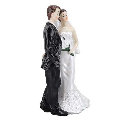Sculpture romantique de couple de mariés en noir et blanc