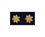  COPPIA STELLE ORO A 7 PUNTE RICAMATE IN CANOTTIGLIA SU PANNO NERO DIM. MAX 2,8 cm