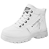 Élégantes et bien assorties : les bottes noires et blanches pour femme sont des bottes d'hiver minimalistes. Convient pour les leggings, les doudounes longues et courtes, les manteaux en tissu, les jeans et les pantalons