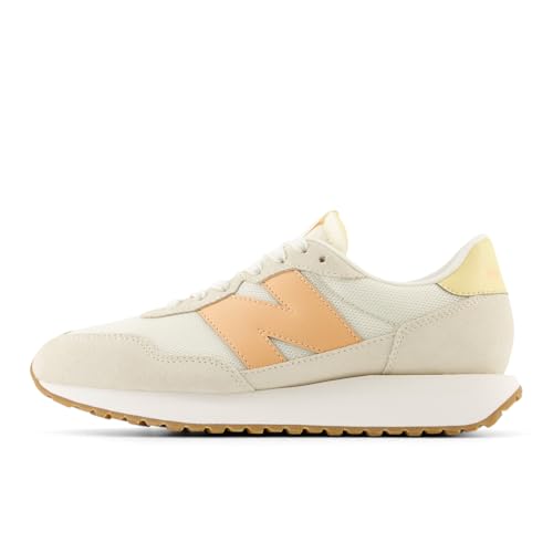 New Balance Women's 237 V1 Sneaker, Angora/Hazy Peach/Washed Amber, 11
