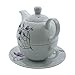 Tetera de porcelana, juego de té para uno Imagen de Tetera de porcelana, juego de té para uno
