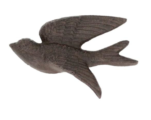 Hirondelle en fer forgé de style naturel pour embellir les murs d'une terrasse fleurie
