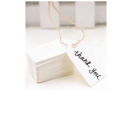 Étiquettes de cadeau vierges en papier kraft Pour prix Avec ficelle de jute. blanc