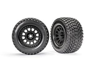 TraxxasTires & wheels, assembled, glued (XRT™ Race black wheels, Gravix™ tires, foam inserts) (left & right)