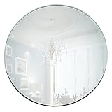 Tu mesa de comedor se mejorará si la decoras con una bandeja de almacenamiento acrílica, que tiene una superficie de espejo y una forma redonda.