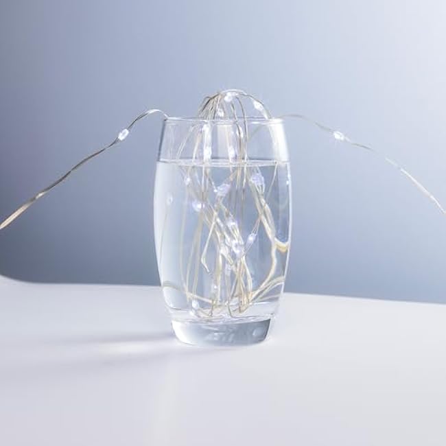 Fairy Lights Plug in,200FT 600LEDs Waterproof Led String Lights,8 Modes Remote Twinkle Light for Outdoor Indoor Christmas Wedding Birthday Garden Party Decorations,Silver Wire,Cool White