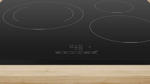 Primer plano de los controles de la placa de inducción Bosch