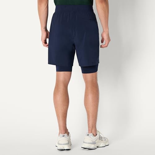 Image of Amazon Essentials Men's Athletic Running Training Shorts, Performance Stretch Woven Workout Shorts, 7 inch