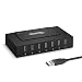 Plugable USB 2.0 7-Port High Speed Charging Hub with 60W Power Adapter.