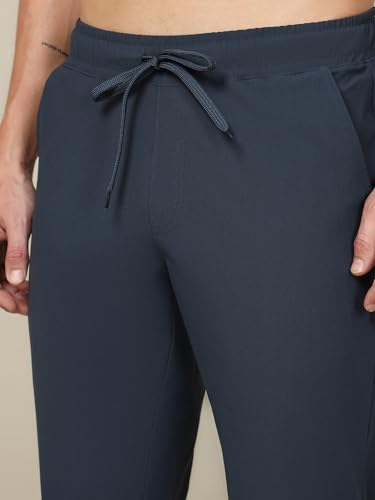 Image of TECHNOSPORT Men's Regular Fit Mid Rise Solid Plus Size Trackpants with Quick Dry, Anti Microbial, SPF50+ for Regular and Sports Use