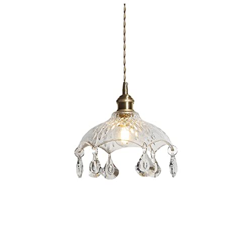 Chandelier en verre transparent et cuivre pour un éclairage loft chic