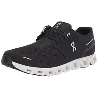 On Women's Cloud 5 Sneakers in all-black, featuring a breathable mesh upper, cloud-like sole for cushioning, and On branding with 'Swiss Engineering' on the tongue, shown in a side view on a white background.