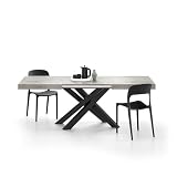 MATERIALES: Las extensiones y el tablero de la mesa Emma color cemento gris están fabricados en melamina de alta calidad, resistente y fácil de limpiar. No se garantiza la continuidad del acabado en el tablero y entre el tablero y las extensiones. Abrir la mesa es sencillo y puede hacerlo una sola persona: el mecanismo está sincronizado y es de metal galvanizado. Las patas cruzadas son de hierro con recubrimiento en polvo. Diseñada exclusivamente para uso en interiores.