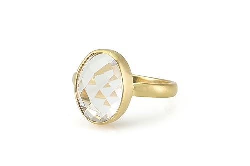 Bague cristal quartz ovale en serti biseauté or d'une clarté pure