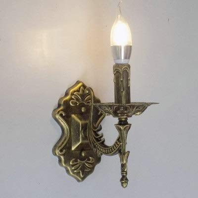 Miroir de chevet bronze cree une ambiance chaleureuse
