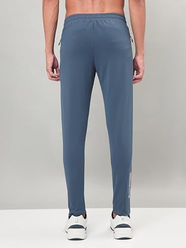 Image of TECHNOSPORT Men's Slim Fit Track Pants with Zip Pockets, ELASTO Plus Quick Dry Stretchable Lightweight Lower for Gym Running Yoga and Sports