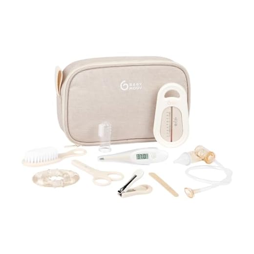 Babymoov Kit para el cuidado del bebé, Compacto, Portátil, Desde el nacimiento, 9 accesorios esenciales que incluyen Cepillo para el Pelo, Termómetro Digital, y de Baño, Cortaúñas, Beige