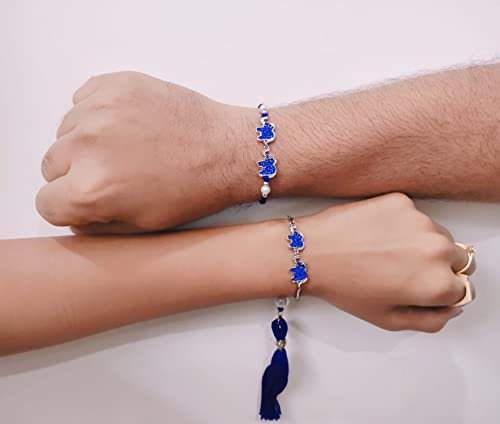 Image of Mahi Rakhi for Brother and Bhabhi with Studded Crystals and Tassels (PARCOL1105521PR)