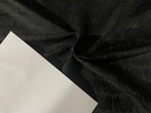 Tissu brocart en soie noir pour vos robes de soirée chic