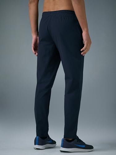 Image of TECHNOSPORT Men's Regular Fit Mid Rise Solid Plus Size Trackpants with Quick Dry, Anti Microbial, SPF50+ for Regular and Sports Use