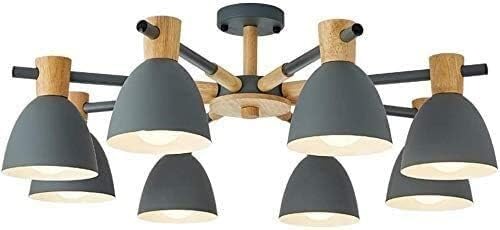 Lustre circulaire en bois éliminant les zones sombres grâce à ses 8 lumières