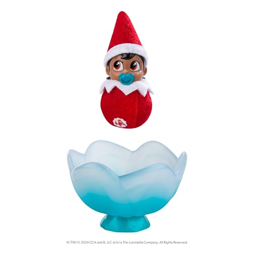 Image of The Elf on the Shelf Frost Pips Mini Blooms Elf Baby Girl with Brown Eyes | Includes a Frost Pips Elf Baby with brown eyes and Frost Flower Cradle.