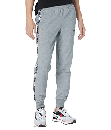 Pantalon PUMA Taping Pants Fleece en vert forest night pour homme