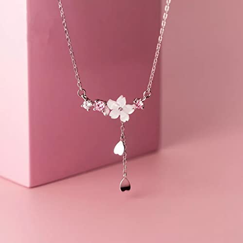 Collier long gland fleur de cerisier en argent pour sublimer vos tenues d'été