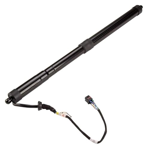 Barre support hydraulique pour coffre VW Touareg chargé de bagages lors des départs en vacances