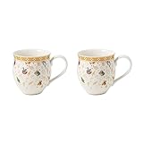 Nostalgischer Becher: Die liebevolle gestaltete Tasse mit weiÃŸen und goldenen Akzenten erinnert an traditionelle Weihnachtsabende aus der Kindheit