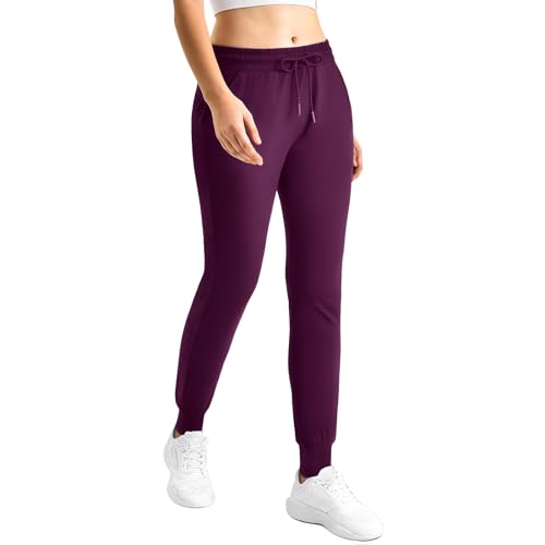 Image of CADITEX Womens Joggers with Pockets,Stretch Active Drawstring Sweatpants Women for Travel Workout Running