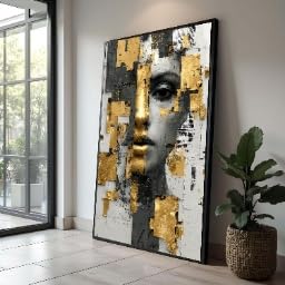 Tableau sur toile visage pour habiller un mur vide avec style or et noir
