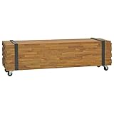 Questo robusto e resistente mobile porta TV è stato realizzato in legno di teak per assomigliare ad una catasta di legna tenuta insieme da un paio di cinture nere