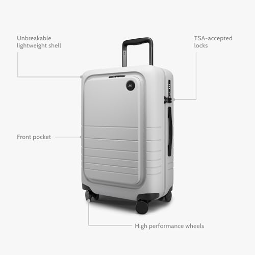 Image of Monos Carry-On Pro Plus Luggage 23 Inch - Hardside Spinner Suitcase with TSA Lock & Laptop Front Pocket | Airline Approved, 42L Polycarbonate Rolling Carry On | Fits 16 inch Laptop | Stellar White