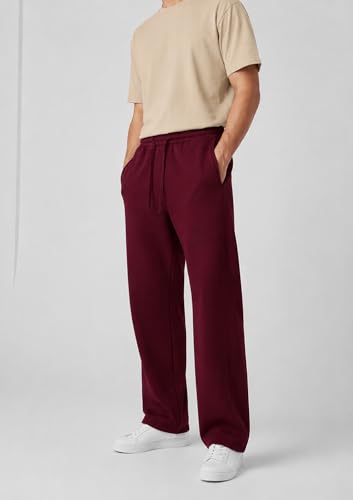 Image of Aesthetic Gothic Wide Leg Pants for Men | Tribal Print Baggy Streetwear | Oversized Track Pants with Elastic Waist | Black and White Relaxed Fit Bottoms