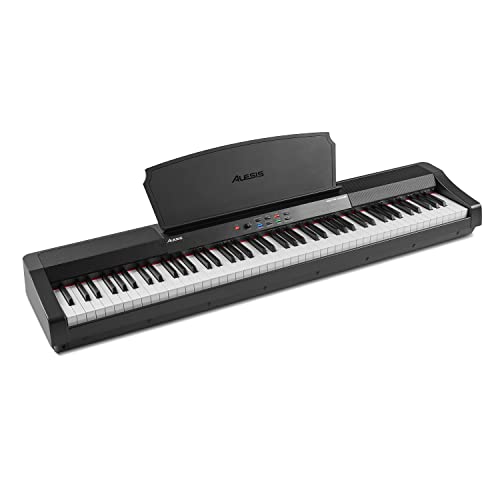Alesis Recital Grand – Piano numérique 88 touches de taille authentique à mécanique graduée à marteau, 16 sons de… - Les Beatles, Paul McCartney, John Lennon, RIngo Starr, George Harrison Alesis Recital Grand – Piano numérique 88 touches de taille authentique à mécanique graduée à marteau, 16 sons de…
