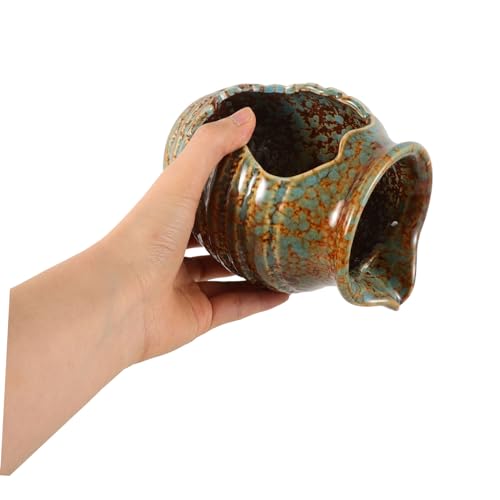 Effet d'eau naturelle avec le pot en céramique vert de balcon