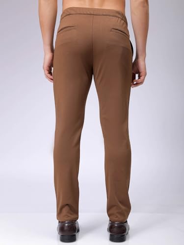 Image of The Indian Garage Co Men Slim Fit Solid Mid-Rise Stretchable Knitted Jogger Trousers