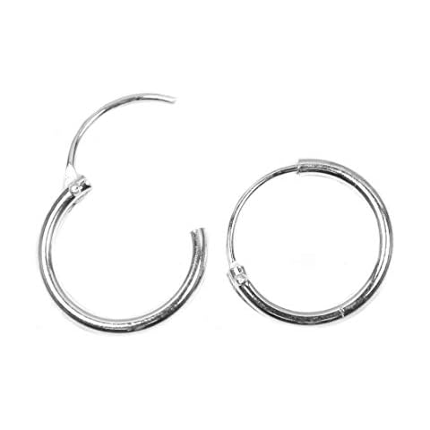 Small sterling silver hoop earrings. 10mm across and hinged opening Cover