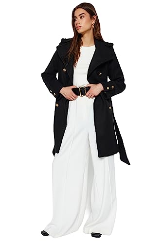 Manteau double-breasted noir au style moderne chic