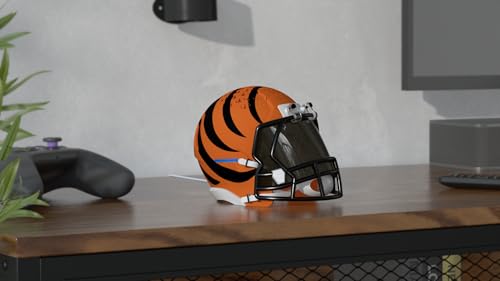 Image of NFL Echo Dot Bundle: Includes Echo Dot | Charcoal and Limited-Edition NFL Helmet Stand | Cincinnati Bengals. Available in All 32 NFL Team Designs. While supplies last.