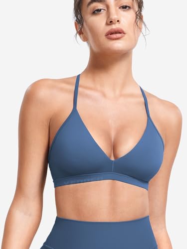 Image of YEOREO CoreFlex Sports Bras for Women Strappy Padded Halter Open Back Light Impact Deep V Neck Yoga Workout Gym Tops
