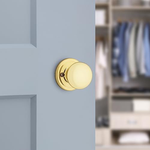 Image of Kwikset Hancock Dummy Doorknob, Single Sided Handle for Closets, French Double Doors, and Pantry, Polished Brass Non-Turning Interior Push /Pull Doorknob