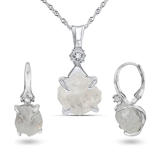 real raw clear quartz drop earrings...