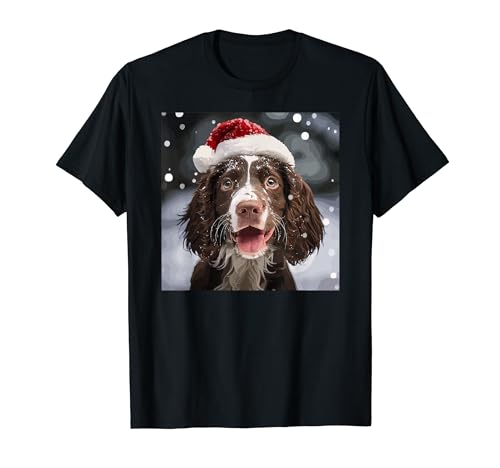 Caratterizzato da un'immagine di un simpatico Springer Spaniel inglese che si diverte sulla neve e indossa un cappello di Babbo Natale, questo design è perfetto da indossare per feste di compleanno, Natale o vacanze in famiglia. Anche una grande idea per la festa della mamma o festa del papà.