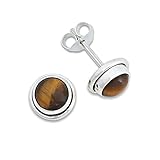 Tigerauge-Schmuck war für mich lange Zeit Oma-Schmuck. Meist in Gold gefasst. Dann aber habe ich entdeckt dass Tigerauge-Schmuck auch modern und zeitlos sein kann. Die verschiedenen braun Töne die im Licht schimmern in Kombination mit glänzendem Silber machen den Schmuck auch für junge Mädchen und Frauen tragbar.