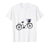 Bonita bicicleta de playa con silueta de crucero con flores coloridas en la cesta