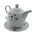 Tetera de porcelana, juego de té para uno Imagen de Tetera de porcelana, juego de té para uno